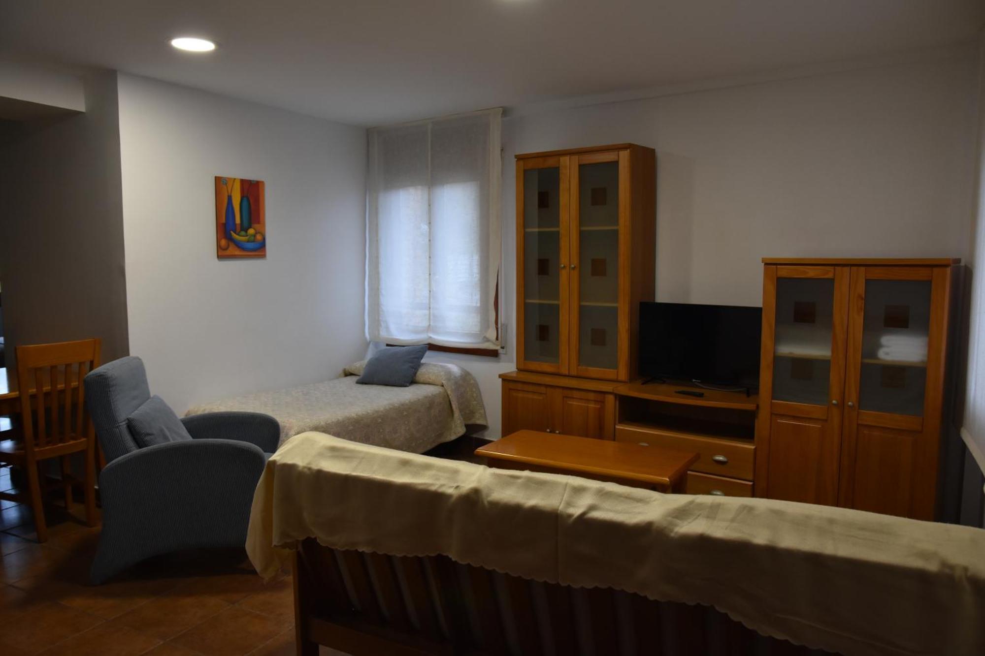 Aparthotel Tres Caminos El Grado Kültér fotó