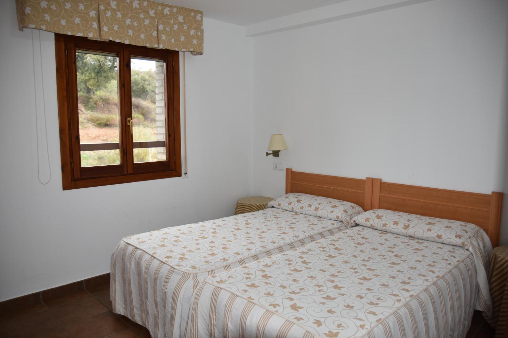Aparthotel Tres Caminos El Grado Kültér fotó